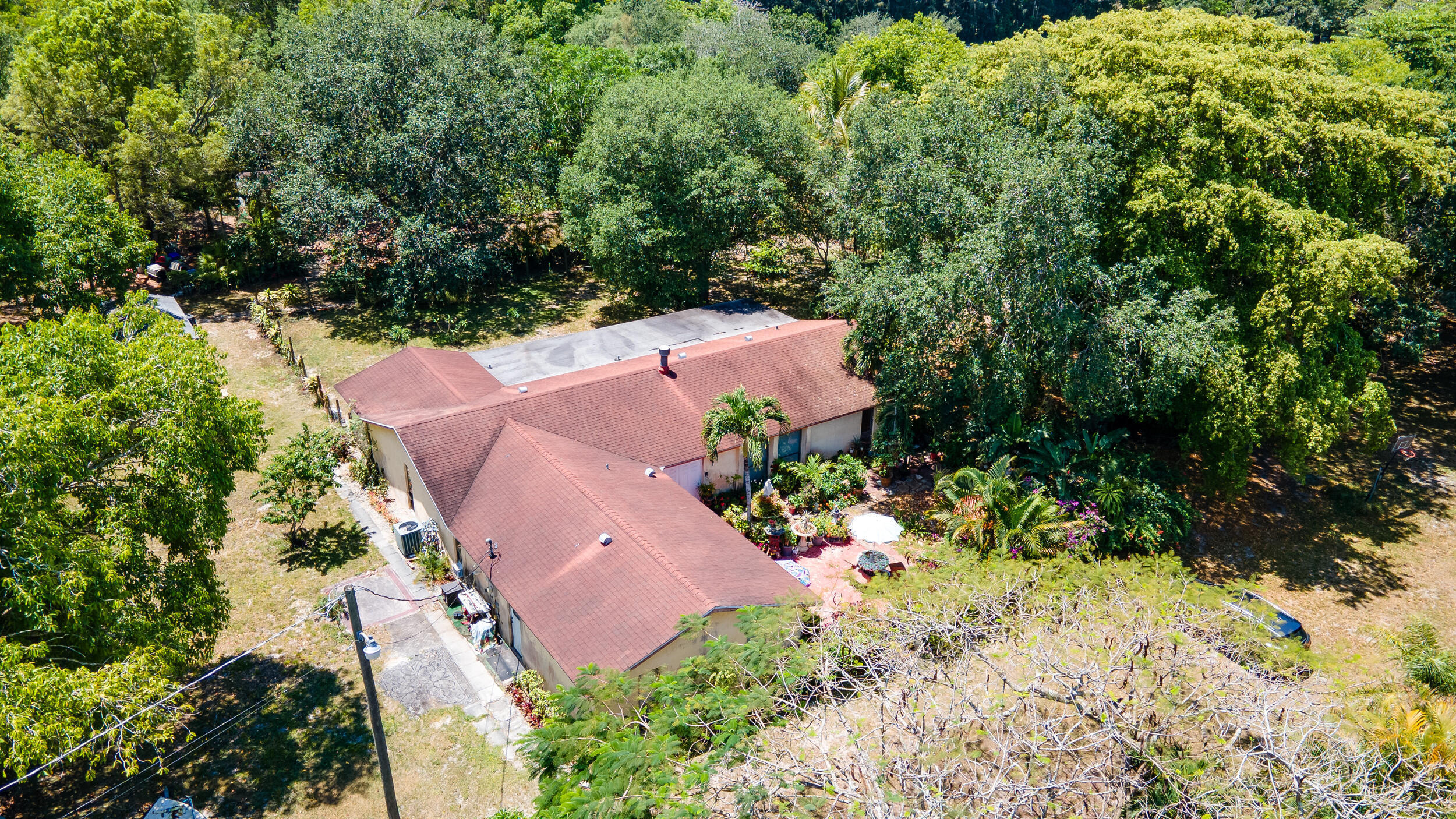 16688 Rustic Road Wellington, FL 33470 - Photo 9 of 14 an aerial view of a house with a yard