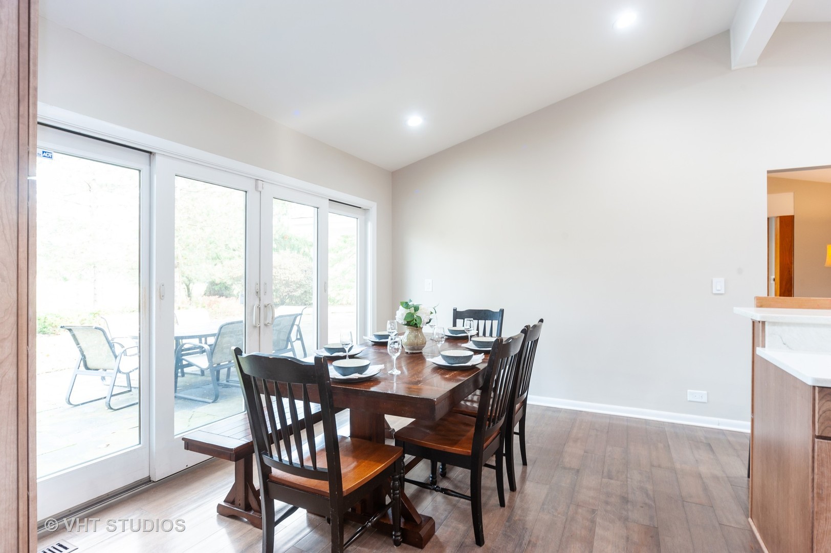 1555 Tower Road Winnetka, IL 60093 - Photo 11 of 27 a view of a dining room with furniture and a window