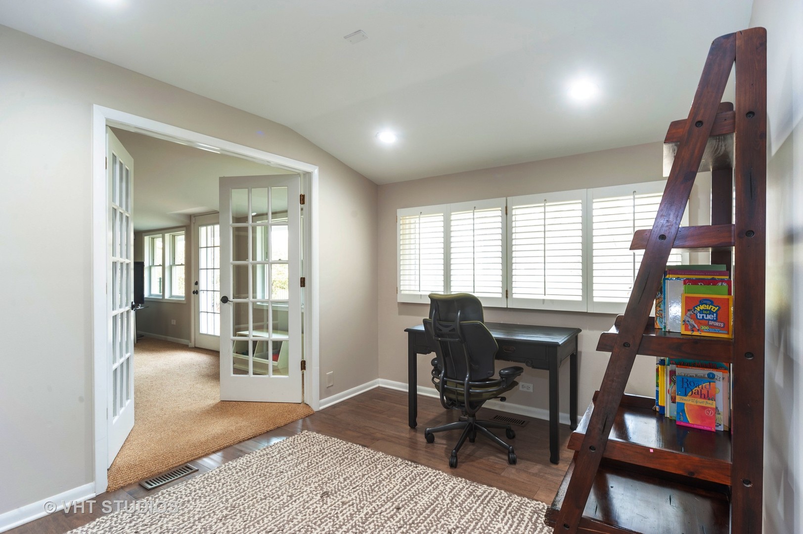 1555 Tower Road Winnetka, IL 60093 - Photo 13 of 27 a view of a workspace with furniture and a window