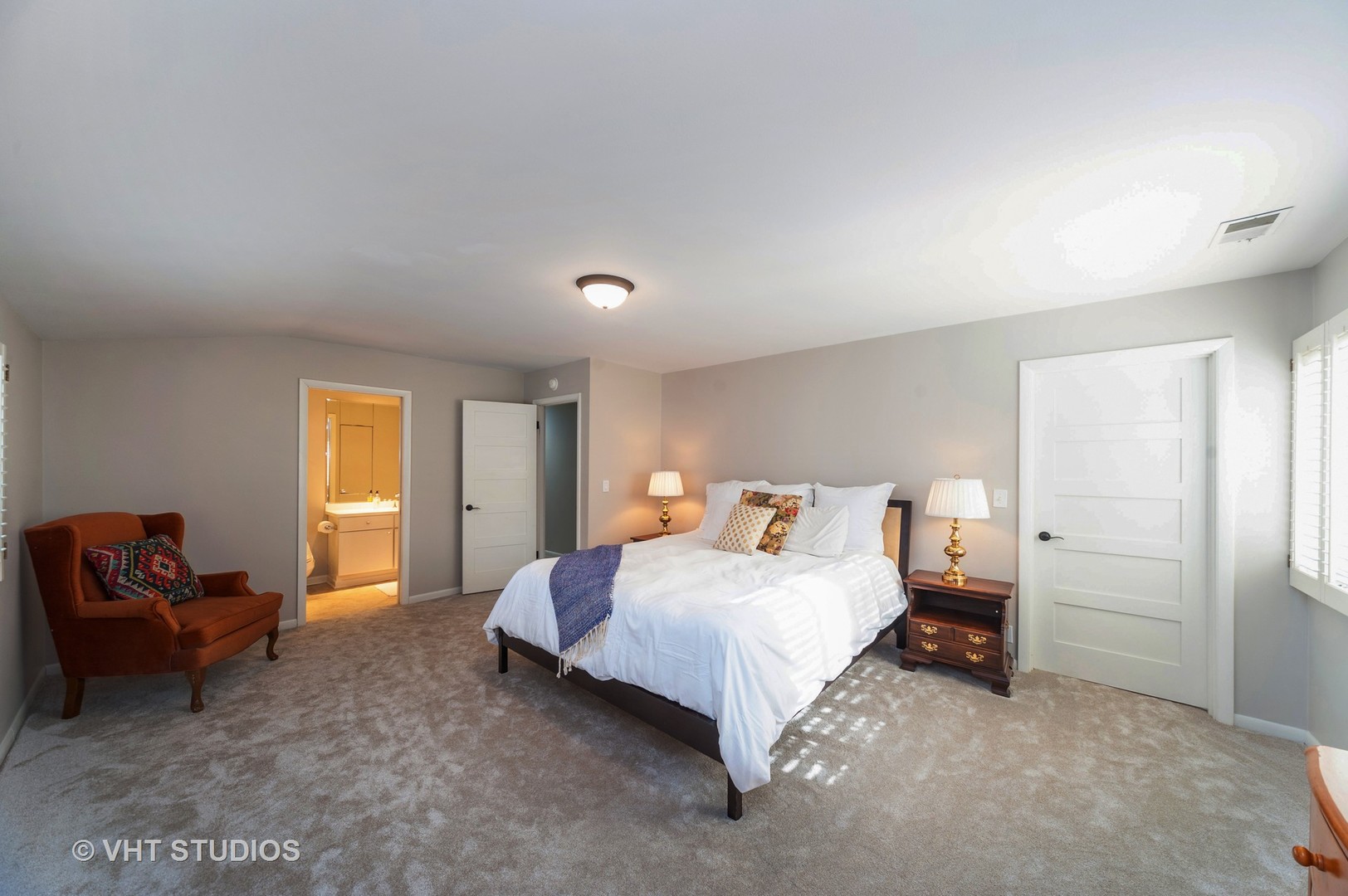 1555 Tower Road Winnetka, IL 60093 - Photo 15 of 27 a bedroom with a bed and a couch