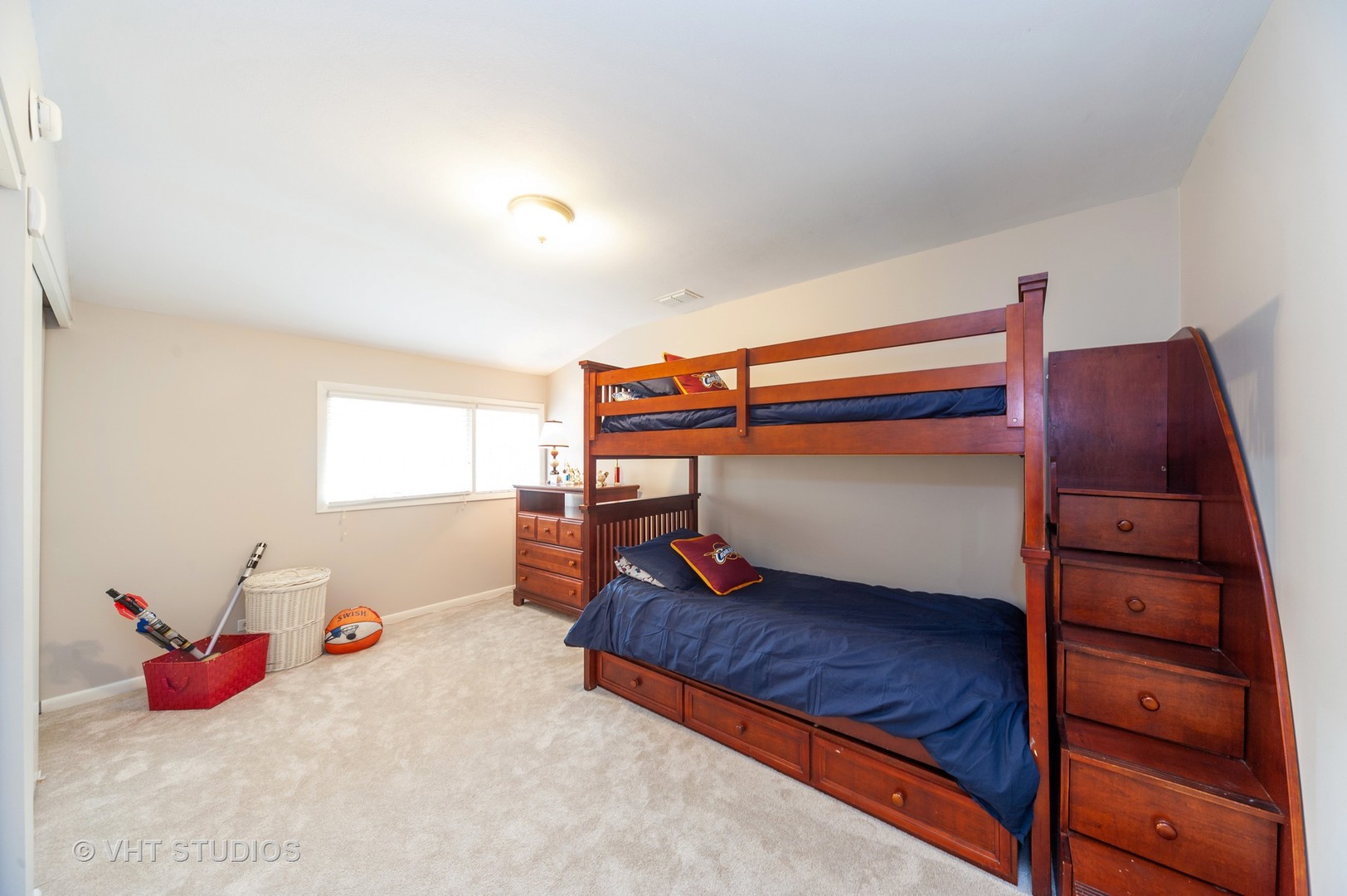 1555 Tower Road Winnetka, IL 60093 - Photo 16 of 27 a bedroom with a bed and a window
