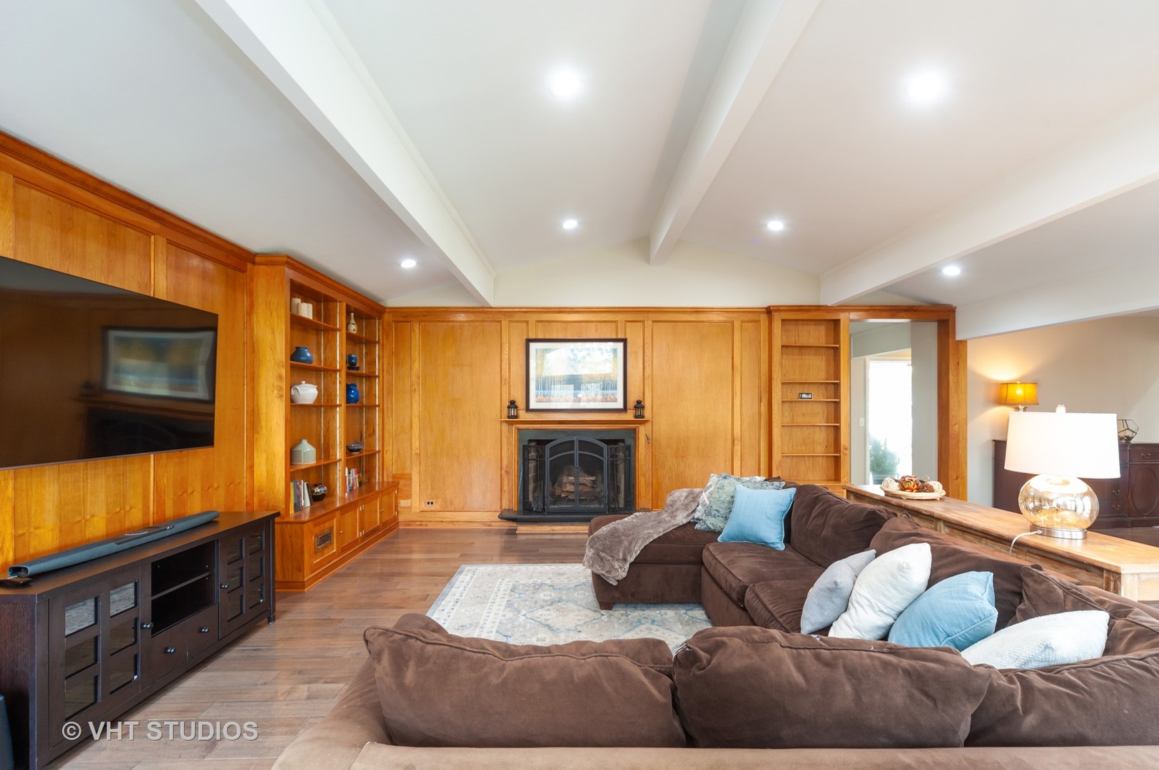 1555 Tower Road Winnetka, IL 60093 - Photo 3 of 27 a living room with furniture and a flat screen tv