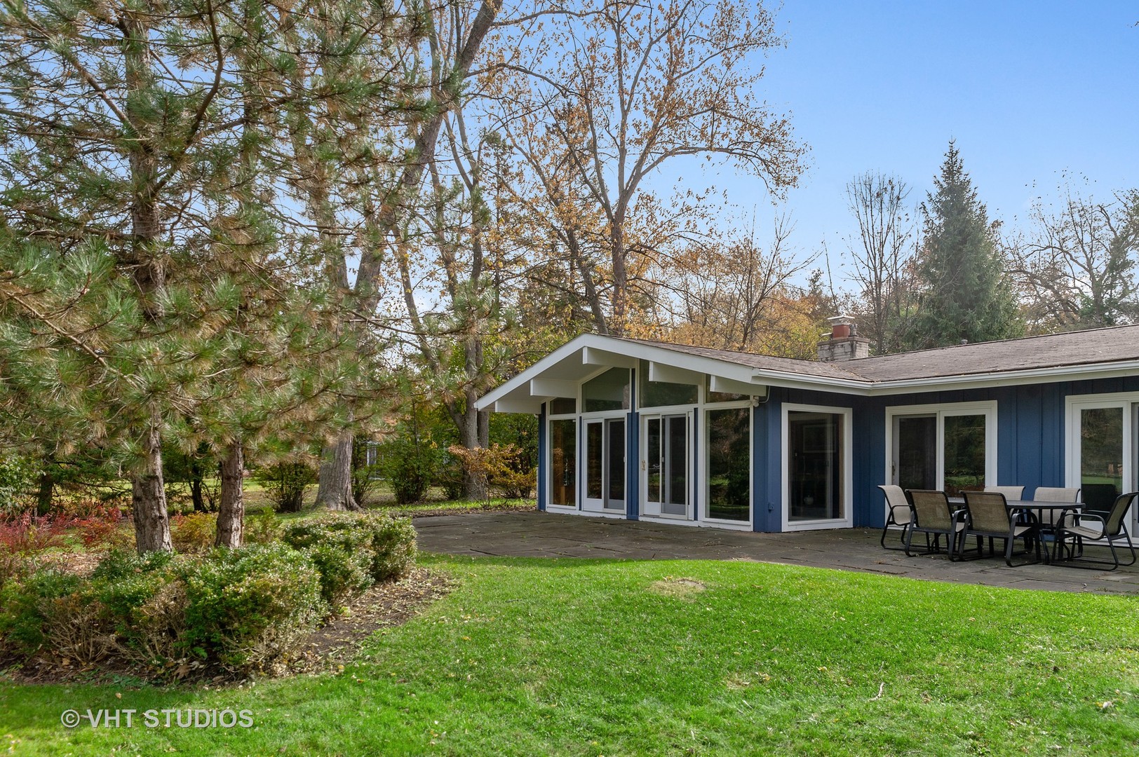 1555 Tower Road Winnetka, IL 60093 - Photo 25 of 27 a view of a house with backyard and porch