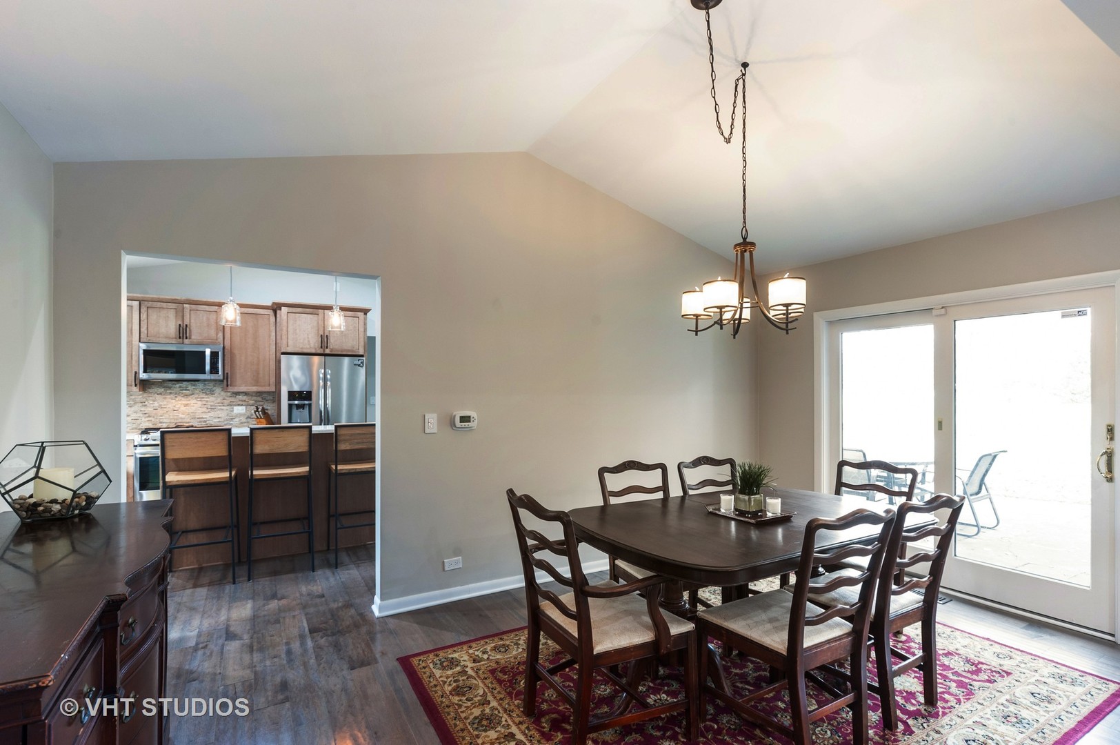1555 Tower Road Winnetka, IL 60093 - Photo 6 of 27 a view of a dining room with furniture window and wooden floor