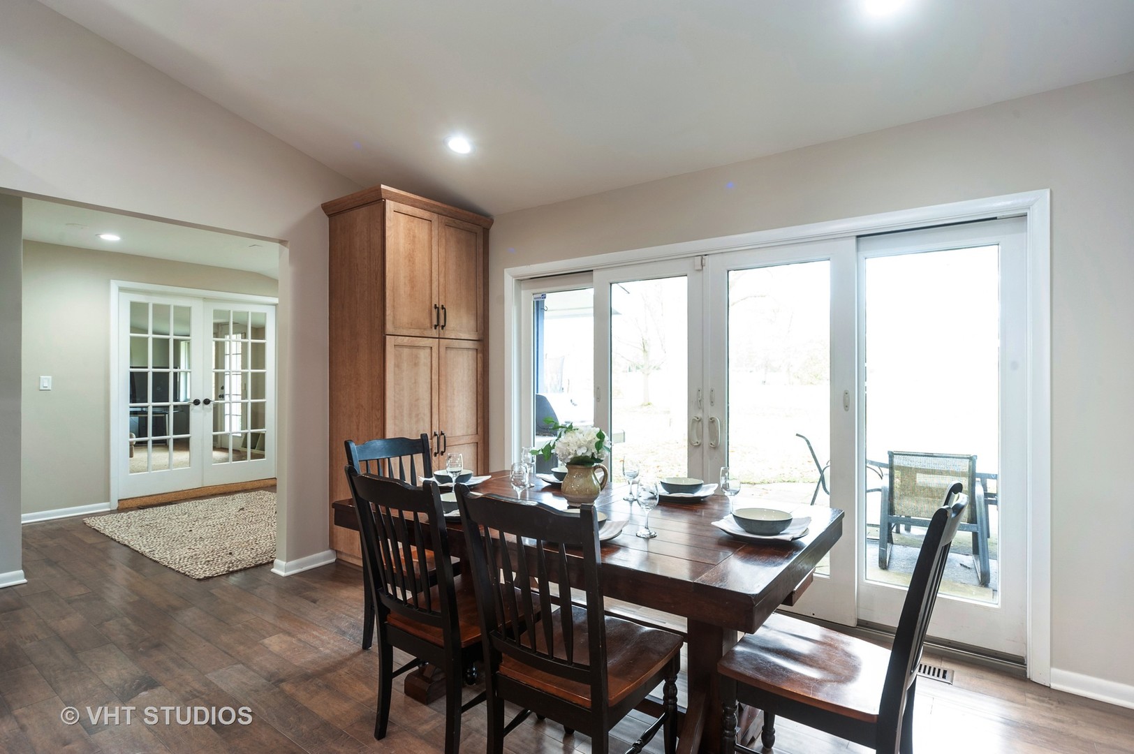 1555 Tower Road Winnetka, IL 60093 - Photo 10 of 27 a view of a dining room with furniture window and outside view