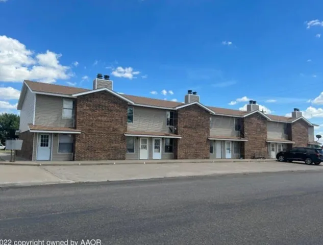 a view of a house with a street