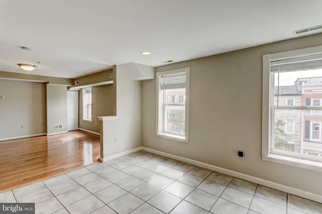 a view of an empty room and window