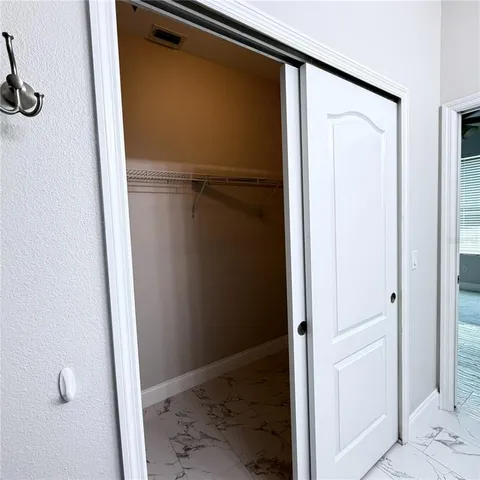 a view of elevator with hallway