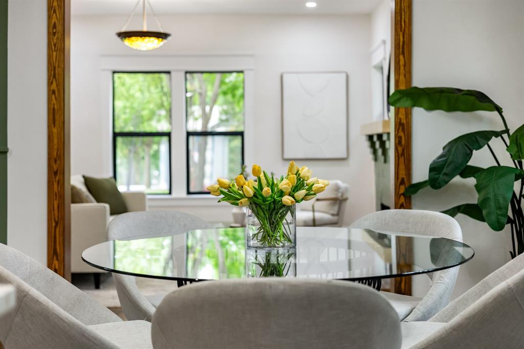 1014 Bolivar Street Denton, TX 76201 - Photo 15 of 36 a view of a dining room with furniture and a potted plant