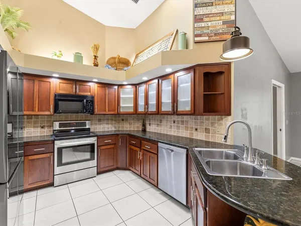 $525,000 | 18602 Winding Oaks Boulevard, Hudson, FL 34667