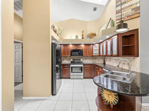 $525,000 | 18602 Winding Oaks Boulevard, Hudson, FL 34667