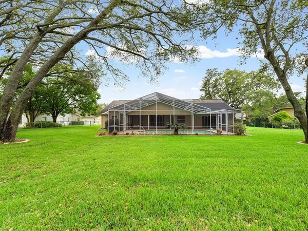 $525,000 | 18602 Winding Oaks Boulevard, Hudson, FL 34667