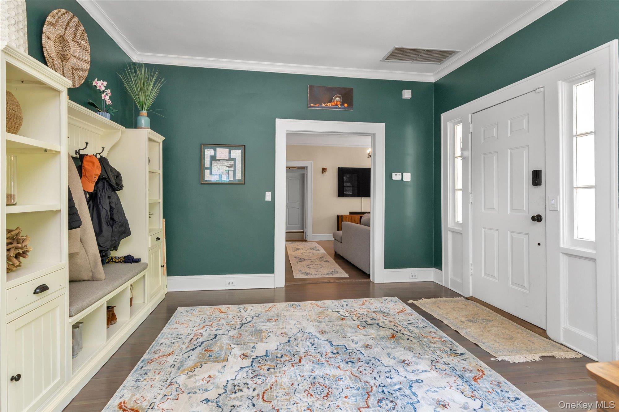 80 Skunks Misery Road Locust Valley, NY 11560 - Photo 6 of 25 a view of a hallway with closet and a window