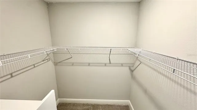 a view of small space with racks on the wall