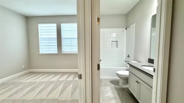 a view of a room with a window