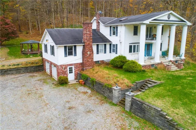 front view of a house with a yard