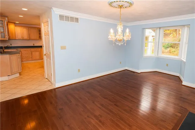 a view of livingroom with hardwood floor and window