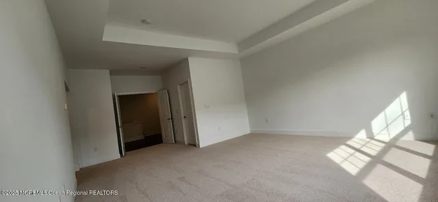 a bathroom with a double vanity sink and mirror