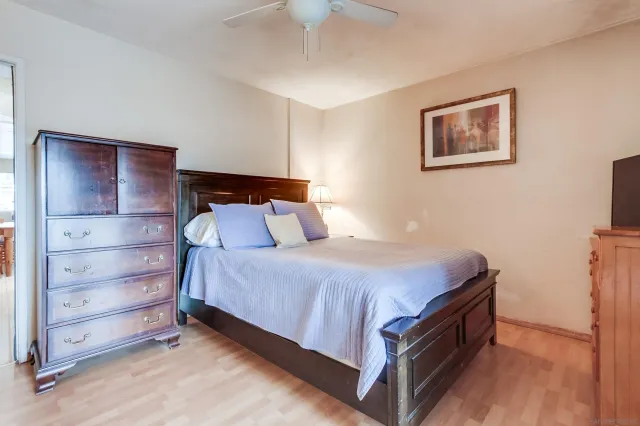 a bed room with a bed and a window