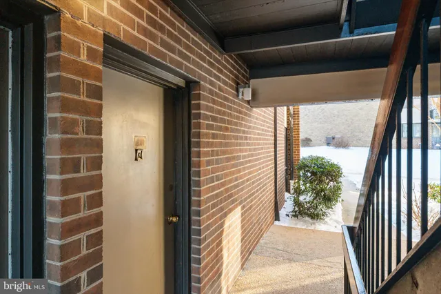 a view of a door and a window