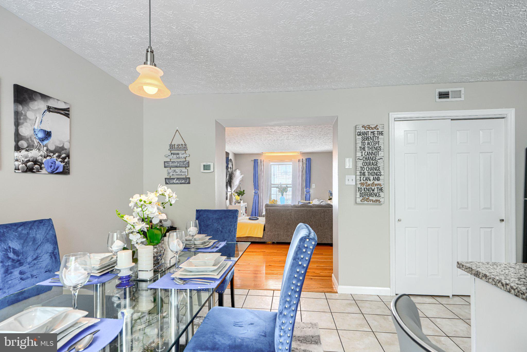 4067 Rustico Road Baltimore, MD 21220 - Photo 11 of 31 Charming dining space with modern flair.