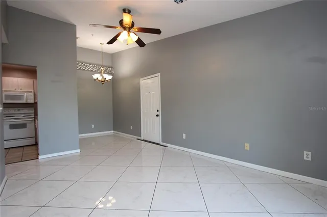 a view of a chandelier fan in kitchen