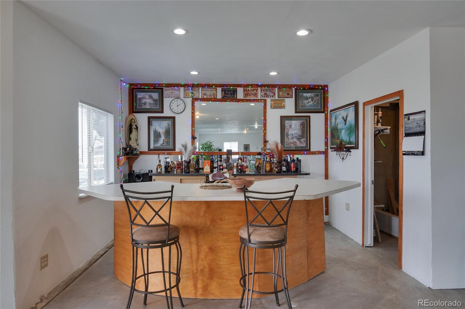 271 Corvette Circle Fort Lupton, CO 80621 - Photo 24 of 39 a living room with stainless steel appliances furniture and a large window