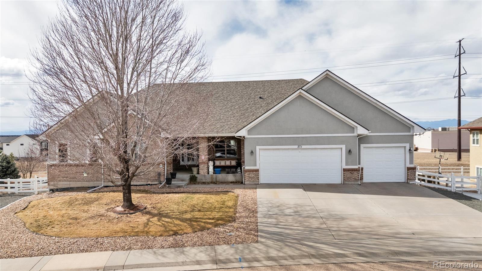 271 Corvette Circle Fort Lupton, CO 80621 - Photo 3 of 39 a view of a house with snow
