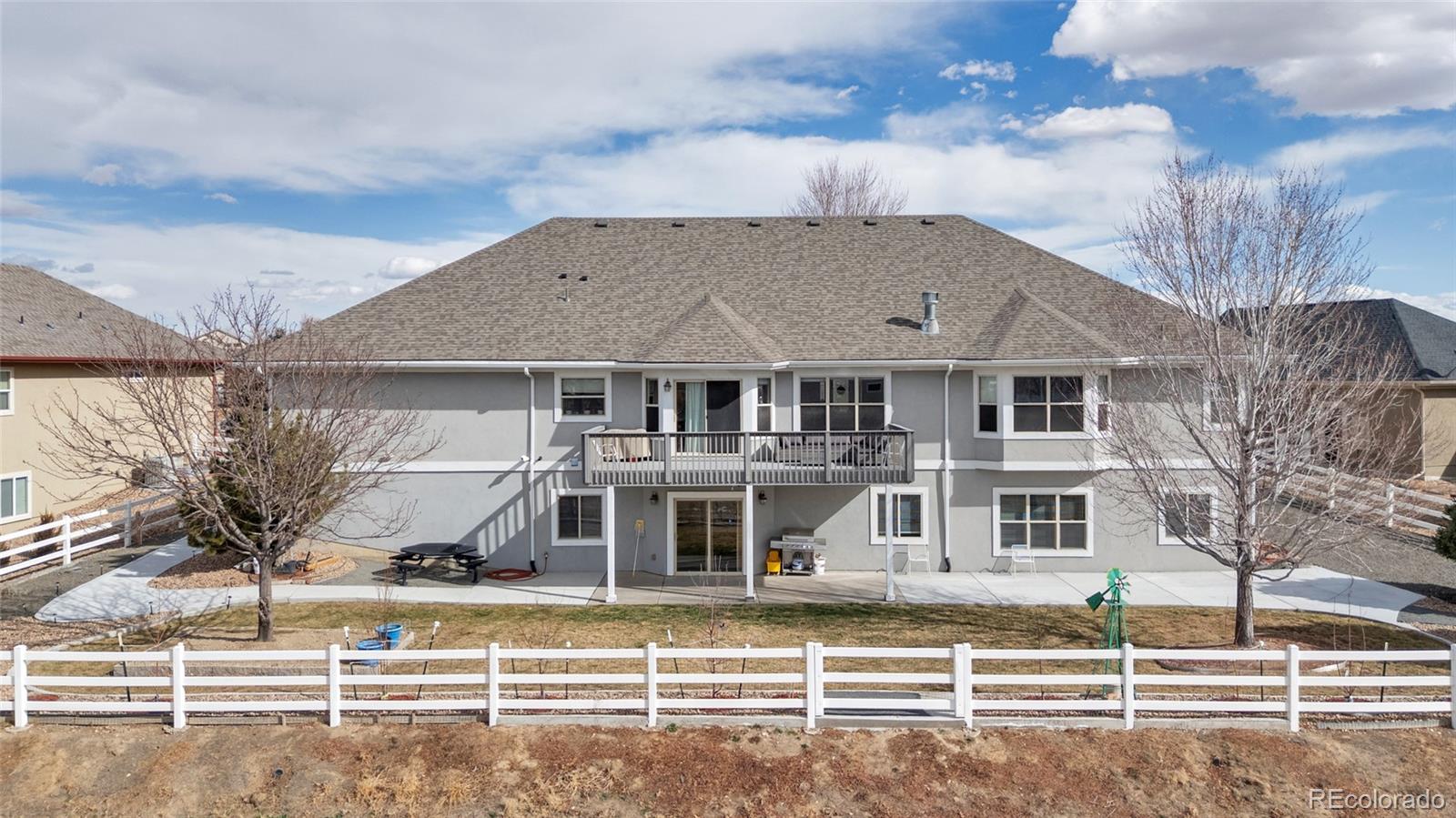 271 Corvette Circle Fort Lupton, CO 80621 - Photo 34 of 39 a front view of a house with a porch
