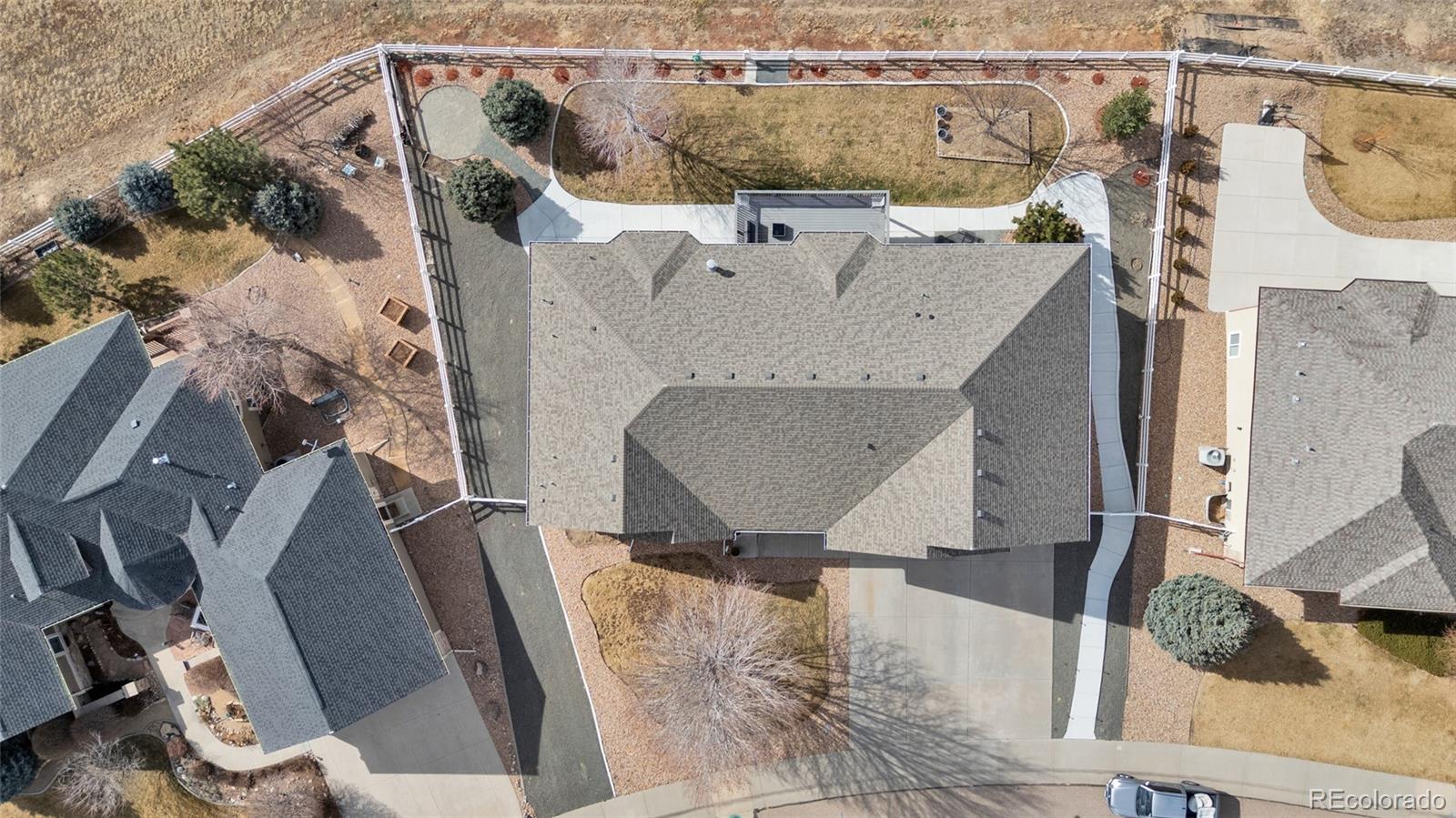 271 Corvette Circle Fort Lupton, CO 80621 - Photo 37 of 39 with view of living room with furniture and a rug
