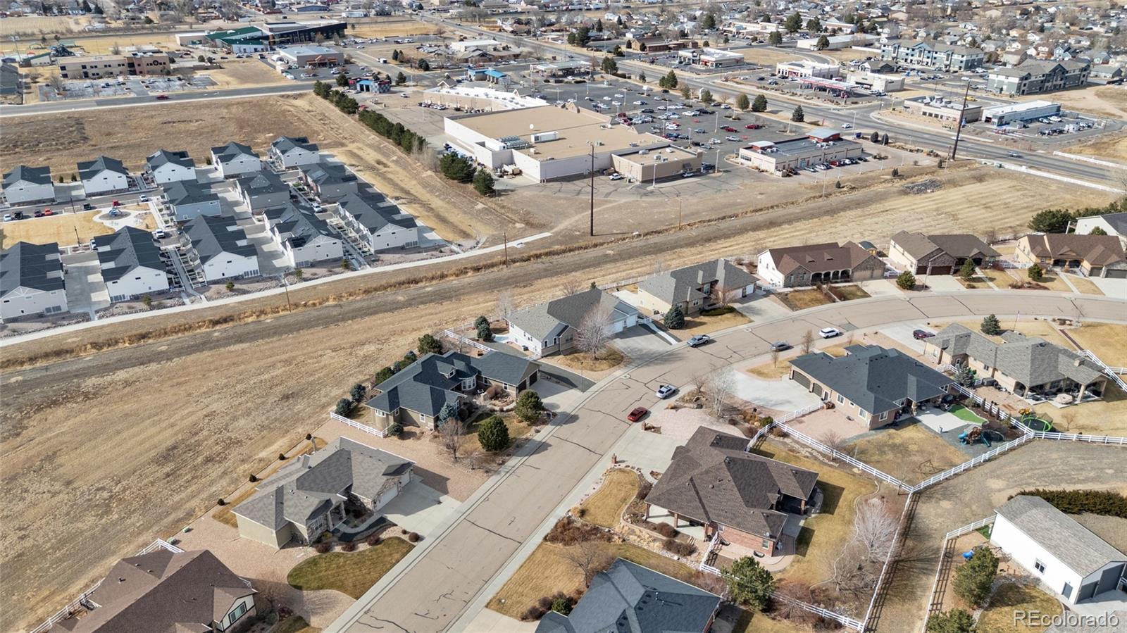 271 Corvette Circle Fort Lupton, CO 80621 - Photo 38 of 39 an aerial view of a city
