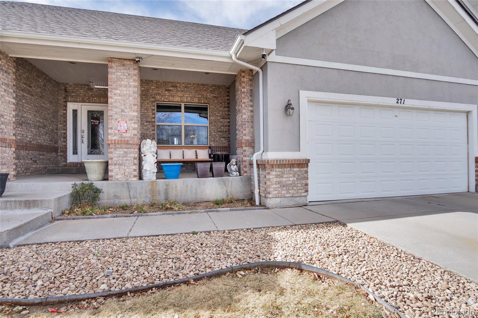 271 Corvette Circle Fort Lupton, CO 80621 - Photo 4 of 39 front view of a house