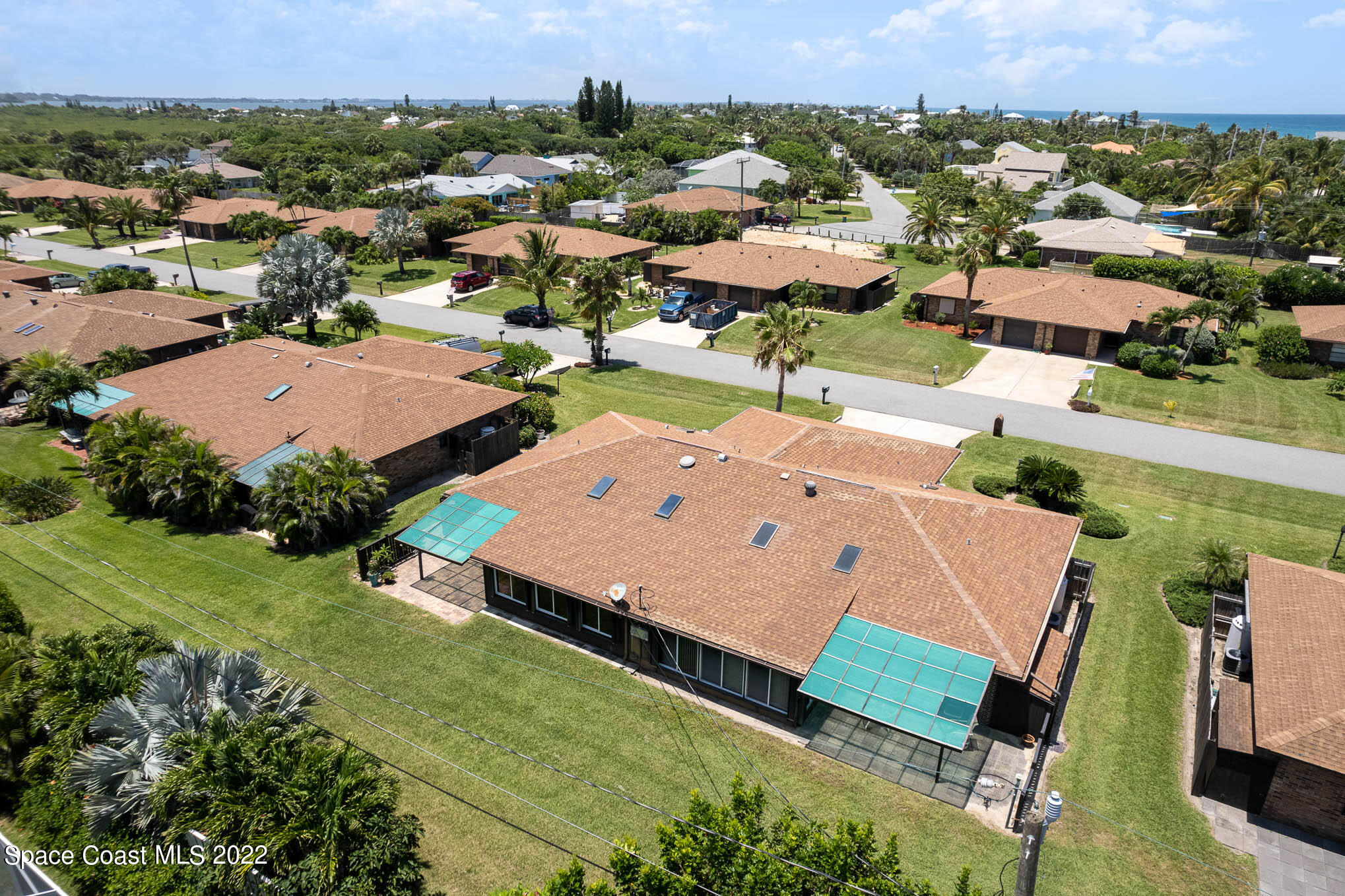 115 Normandy Place Melbourne Beach, FL 32951 - Photo 22 of 31 an aerial view of a house with a garden