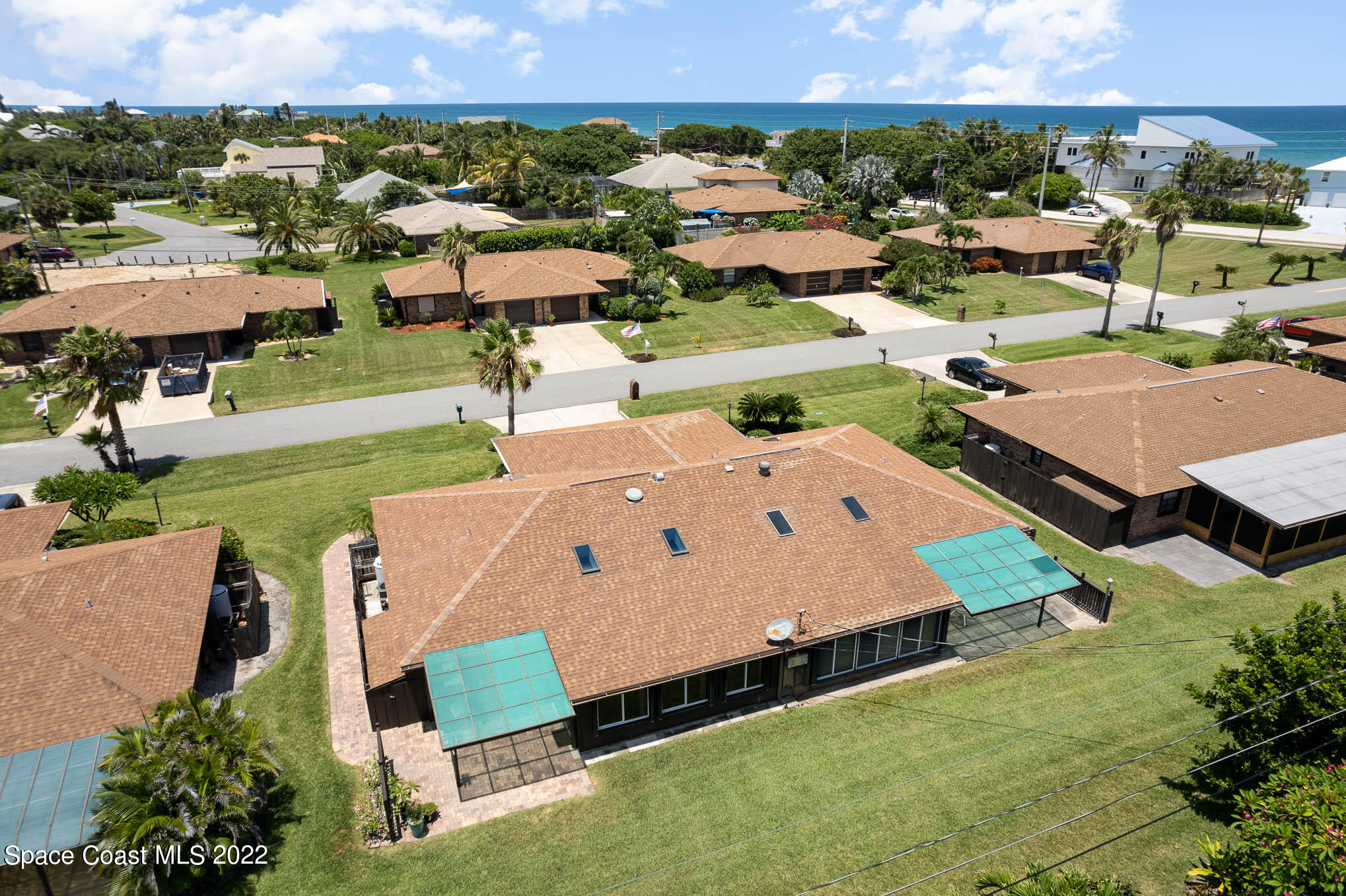 115 Normandy Place Melbourne Beach, FL 32951 - Photo 23 of 31 an aerial view of a house with a garden