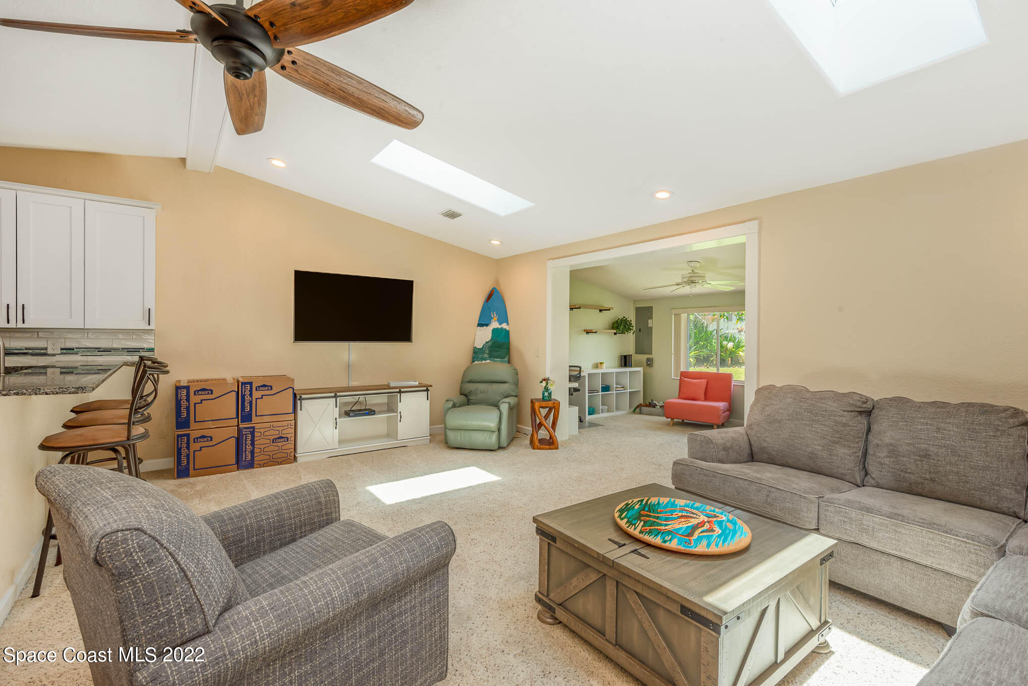 115 Normandy Place Melbourne Beach, FL 32951 - Photo 5 of 31 a living room with furniture and a flat screen tv