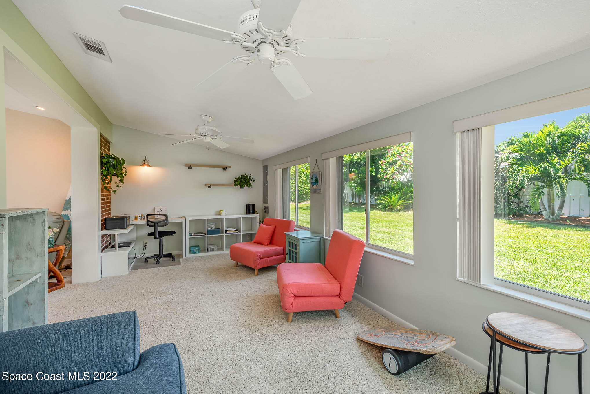 115 Normandy Place Melbourne Beach, FL 32951 - Photo 6 of 31 a living room with furniture and a window