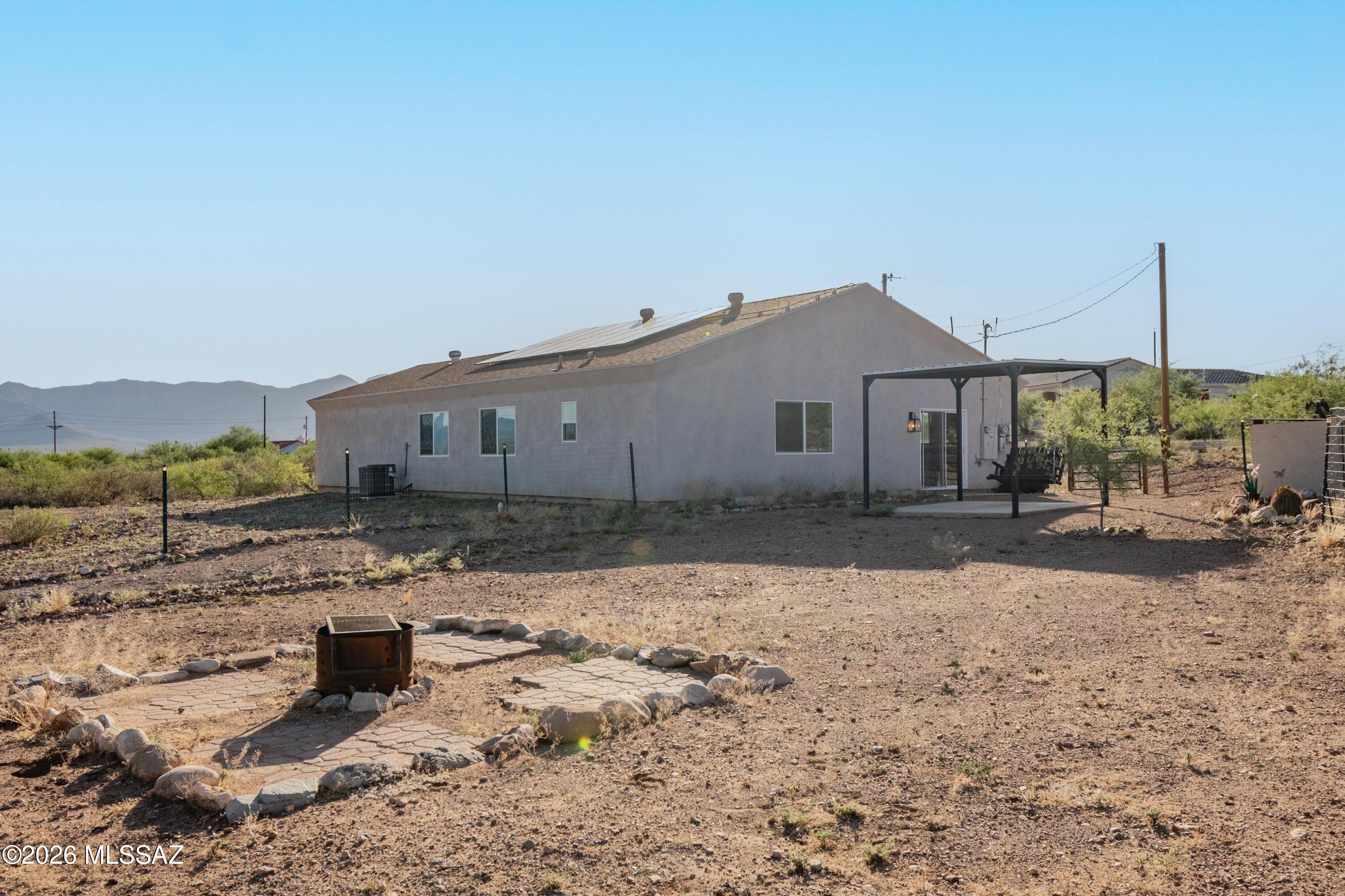1785 Dove Court Rio Rico, AZ 85648 - Photo 31 of 31 a house view with a backyard space