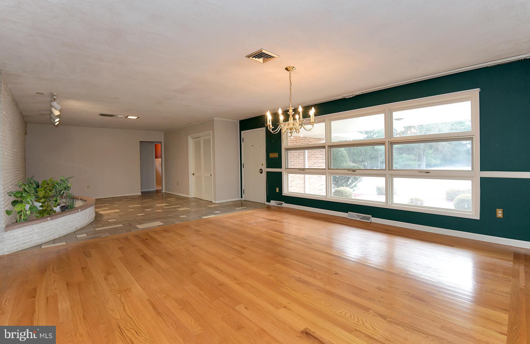 28 West Church Road Lawrence Township, NJ 08648 - Photo 17 of 32 a view of an empty room with a window