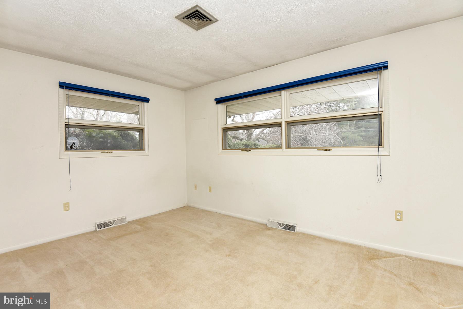 28 West Church Road Lawrence Township, NJ 08648 - Photo 28 of 32 an empty room with a window