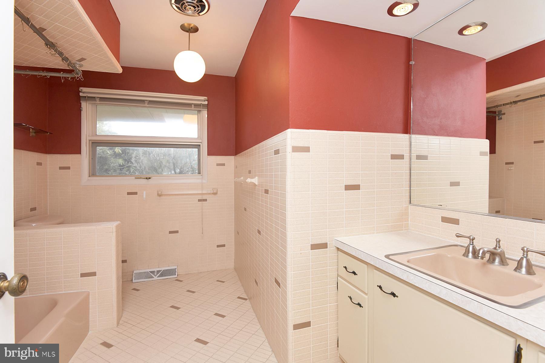 28 West Church Road Lawrence Township, NJ 08648 - Photo 32 of 32 a bathroom with a sink vanity granite tub and shower