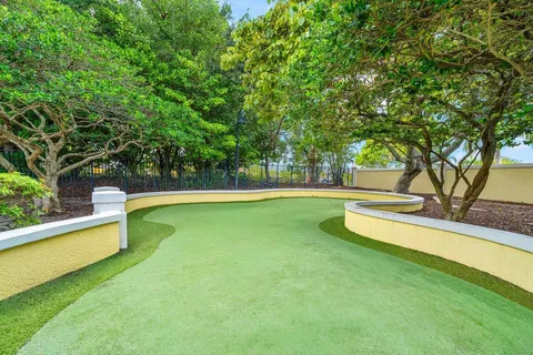 a view of yard and swimming pool