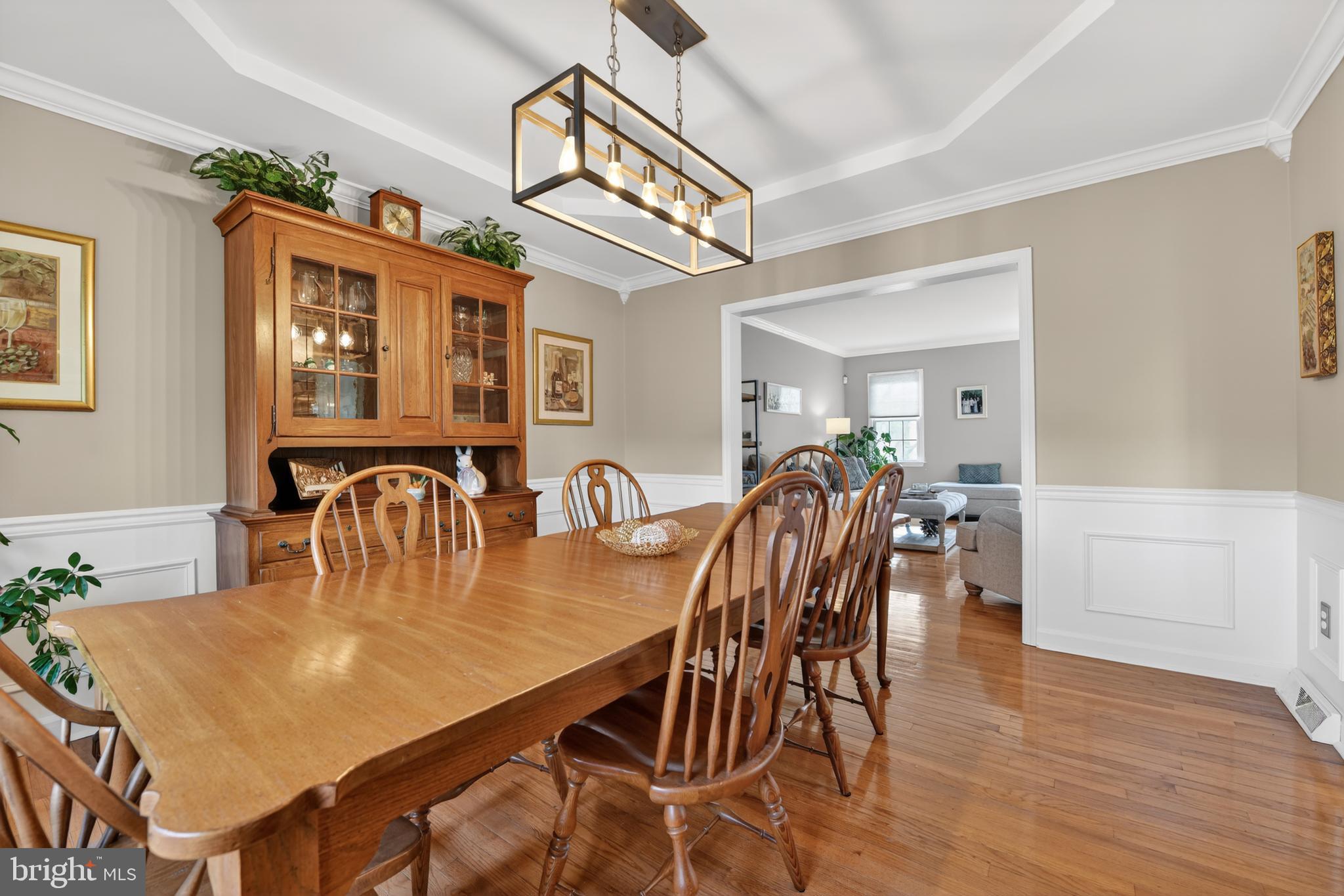 110 Pennsylvania Avenue Sinking Spring, PA 19608 - Photo 11 of 53 a dining room with furniture a chandelier and wooden floor