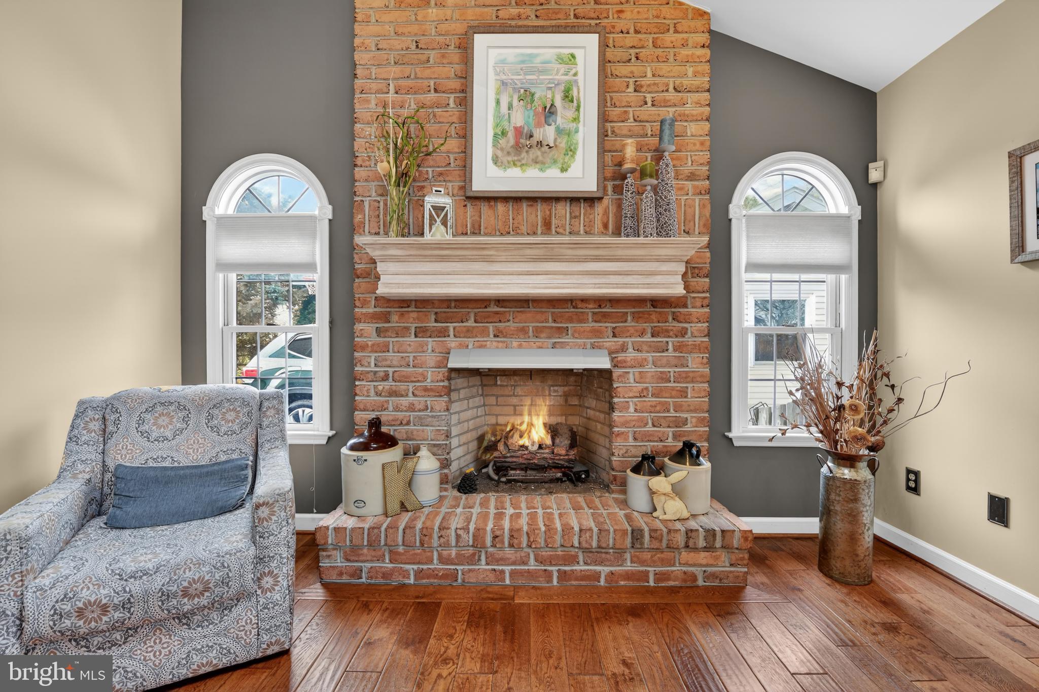 110 Pennsylvania Avenue Sinking Spring, PA 19608 - Photo 19 of 53 a living room with furniture fireplace and wooden floor
