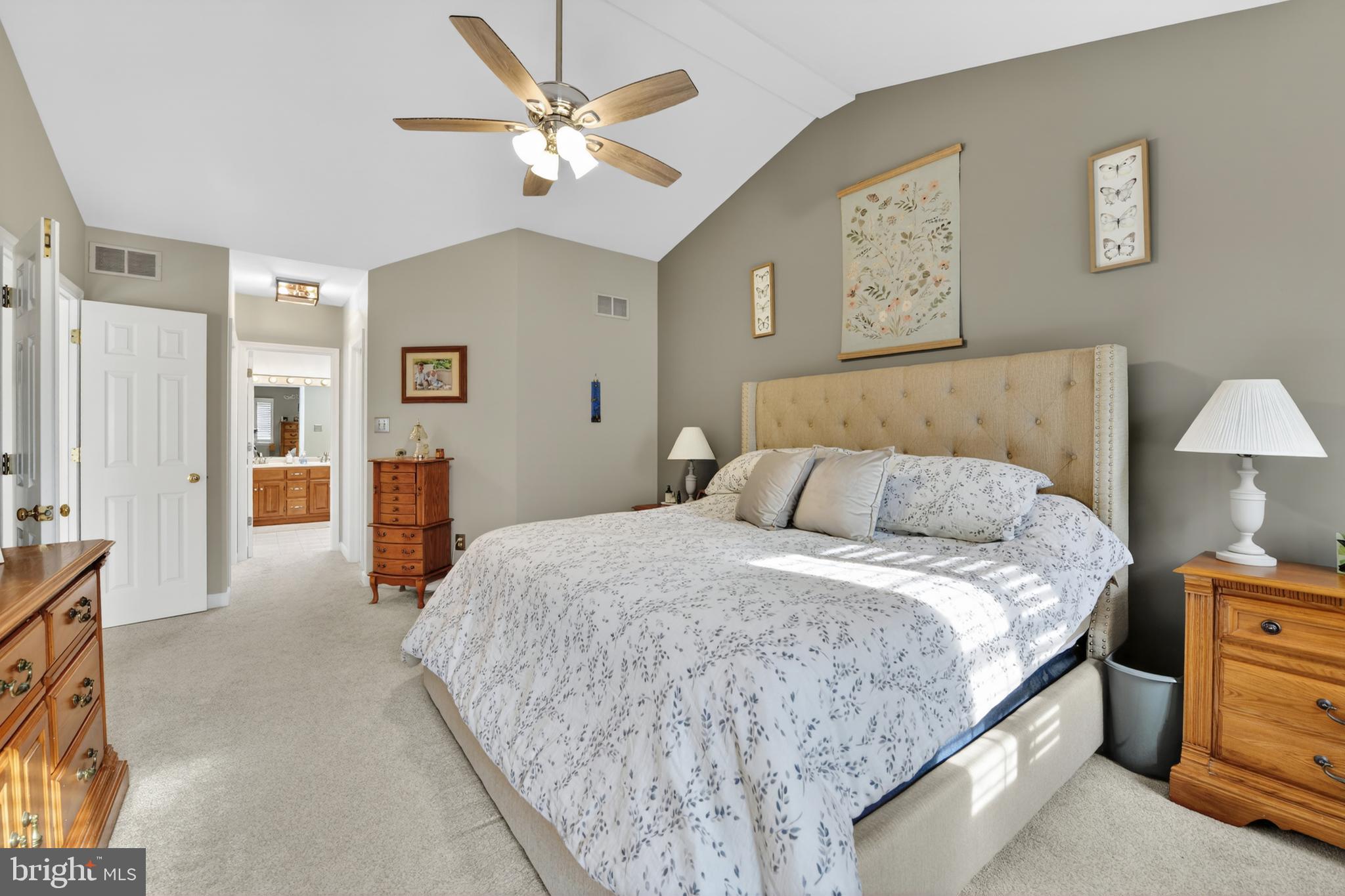 110 Pennsylvania Avenue Sinking Spring, PA 19608 - Photo 23 of 53 a bedroom with a large bed and a chandelier