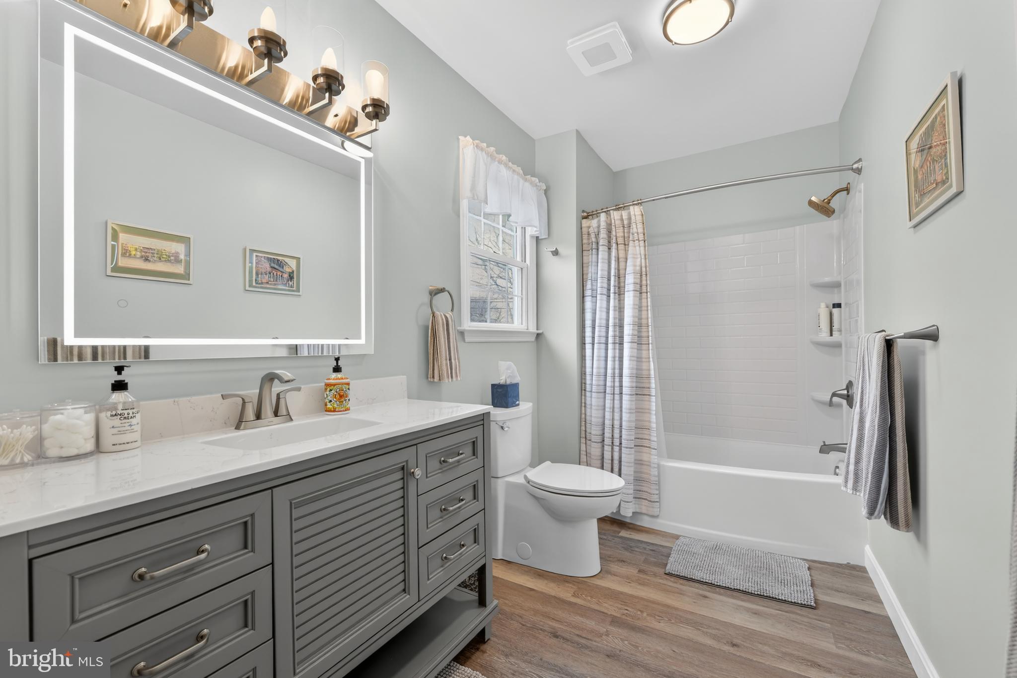 110 Pennsylvania Avenue Sinking Spring, PA 19608 - Photo 29 of 53 a bathroom with a double vanity sink toilet and shower