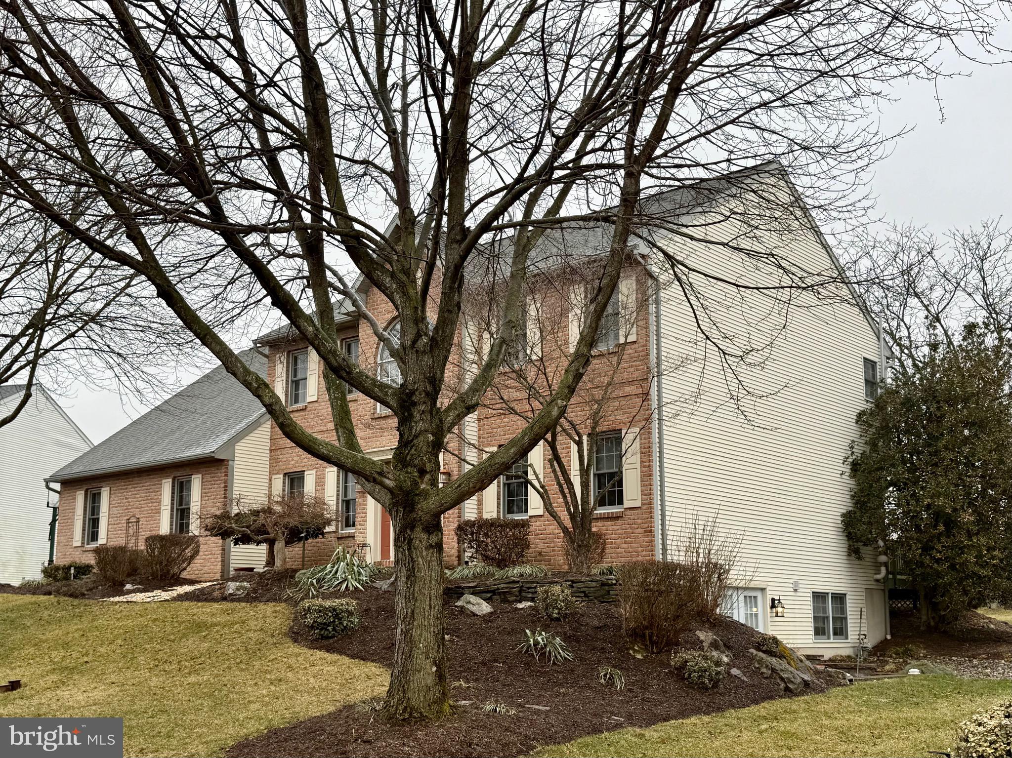 110 Pennsylvania Avenue Sinking Spring, PA 19608 - Photo 52 of 53 a tree in front of a white house