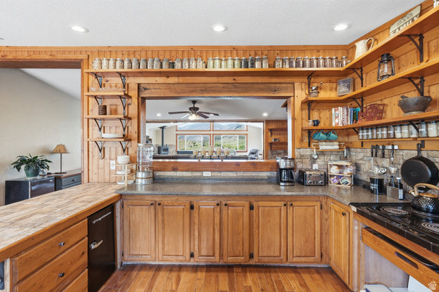 8066 North Valley View Heights Preston, ID 83263 - Photo 13 of 34 Kitchen featuring wood-finish flooring, wood cabinetry, and open shelving