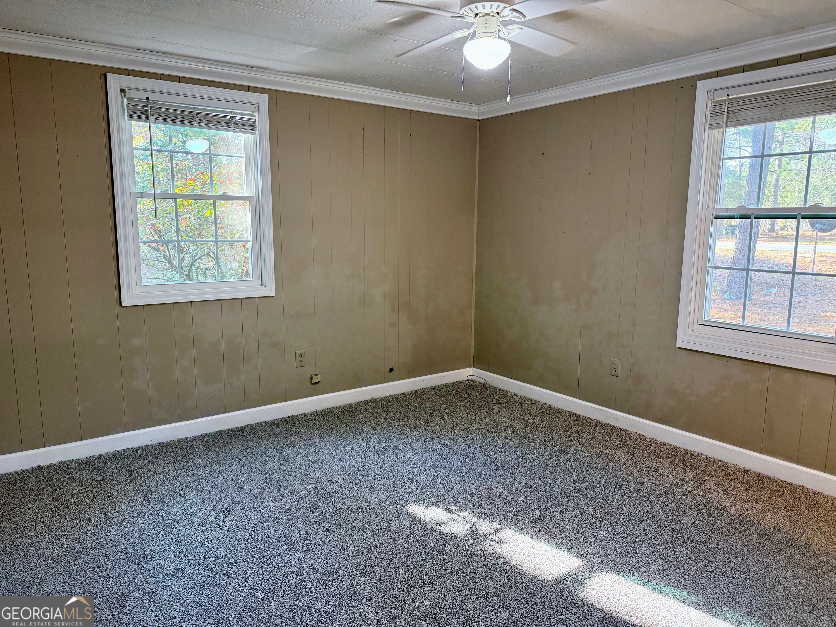 822 North Lewis Street Metter, GA 30439 - Photo 14 of 19 an empty room with a window