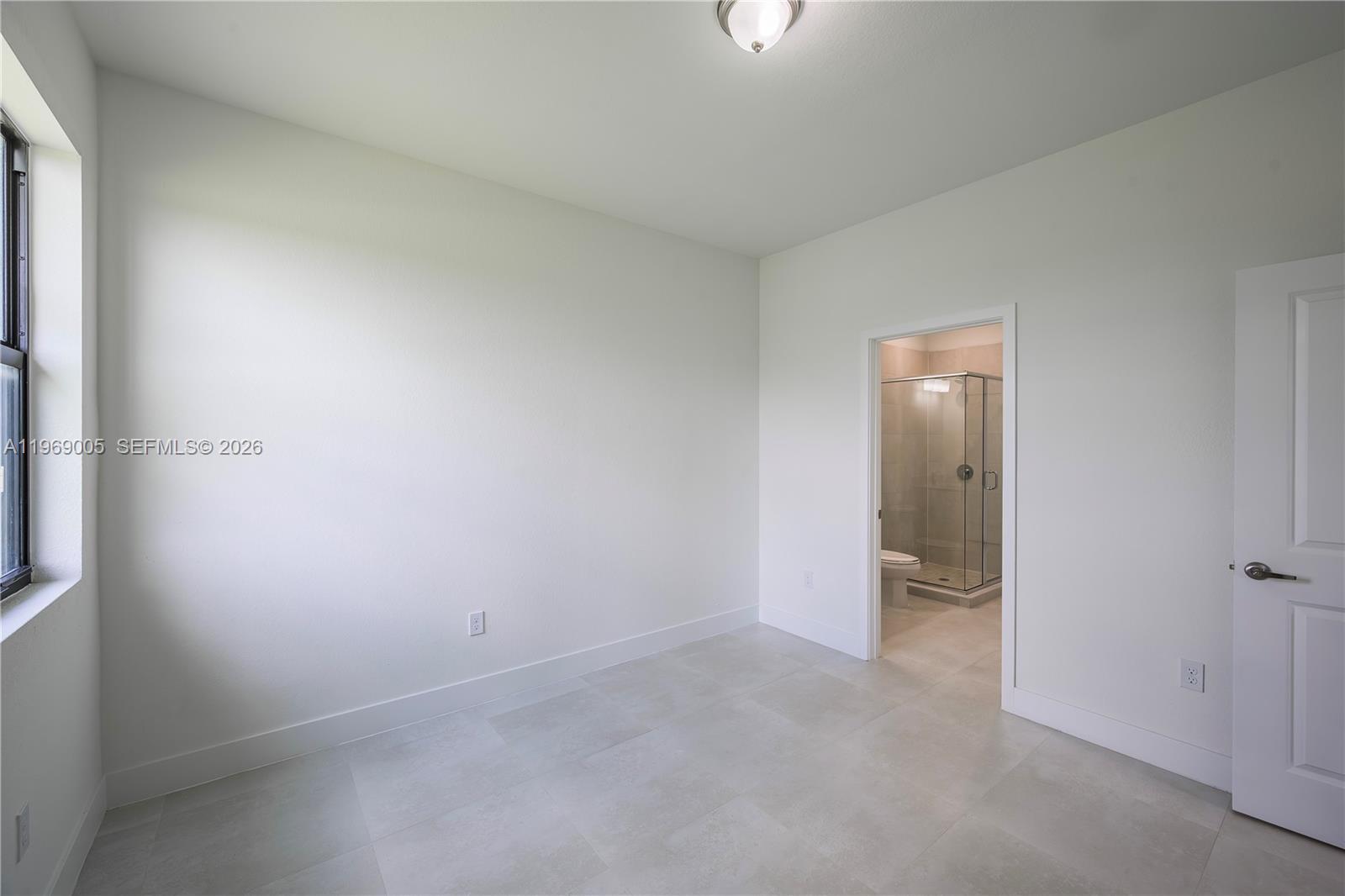 32242 Southwest 194th Avenue Homestead, FL 33030 - Photo 15 of 42 an empty room with a empty space