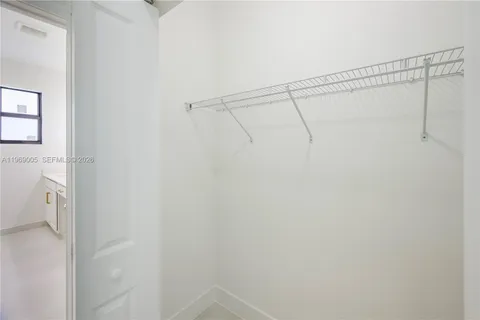 a view of a room with racks on the wall